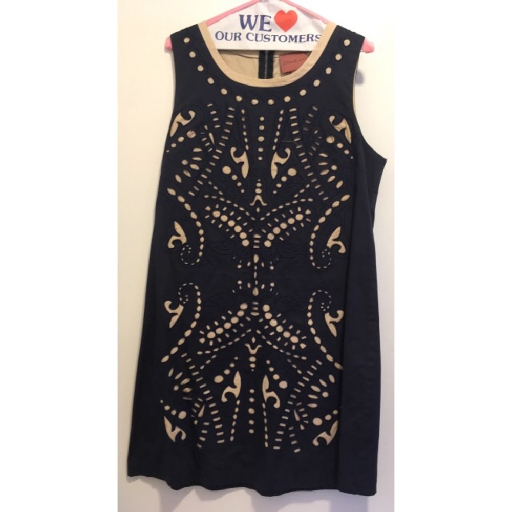 Sheath dress with front cut-out details